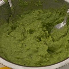 A picture of Guacamole with bread toast.