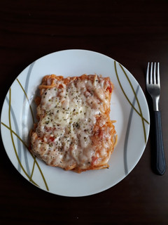 Una foto de Tallarines con salsa y muzzarella al horno