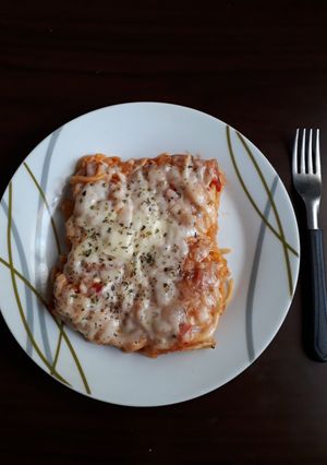 Una foto de Tallarines con salsa y muzzarella al horno