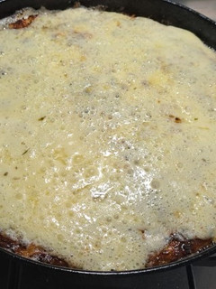 Una foto de Tortilla de coliflor con jamón y queso al horno