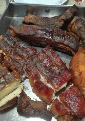 Una foto de Chancho asado a la Caja China 🐽