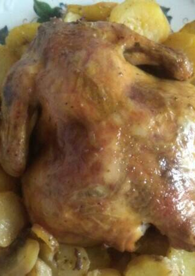 Una foto de Pollo al horno con patatas