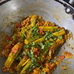 A picture of Tomato Drumstick Curry!.