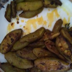 A picture of Potol bhaja(pointed gourd fry).