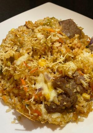Una foto de Arroz al horno con queso🧀👩‍🍳❤