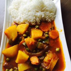 A picture of Rice and peas stew.