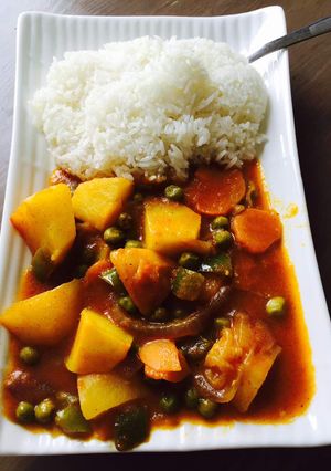 A picture of Rice and peas stew.