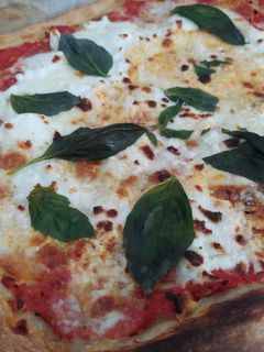 Una foto de Pizza