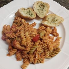 A picture of Chicken & Tomato pasta in Mascarpone sauce.