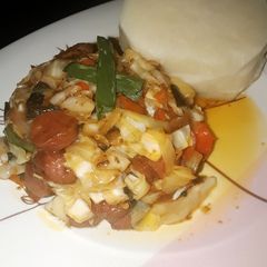Boiled yam with cabbage sauce A picture of Boiled yam with cabbage sauce.