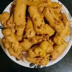 Crispy Green Chilli Pakora/Mirchi Vada A picture of Crispy Green Chilli Pakora/Mirchi Vada.