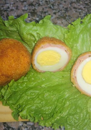 Una foto de Huevos duros con jamón rebozados