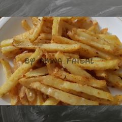 A picture of Spicy fries with sauce.