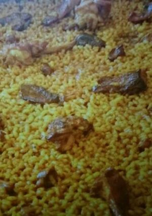 Una foto de Arroz con conejo