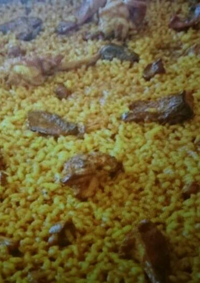 Una foto de Arroz con conejo