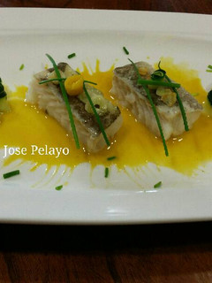 Una foto de Bacalao en salsa de pimientos amarillos