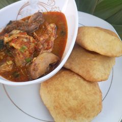 Khubza/ alfatira with psoup A picture of Khubza/ alfatira with psoup.