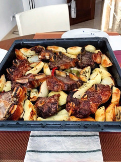 Una foto de Asado argentino al horno