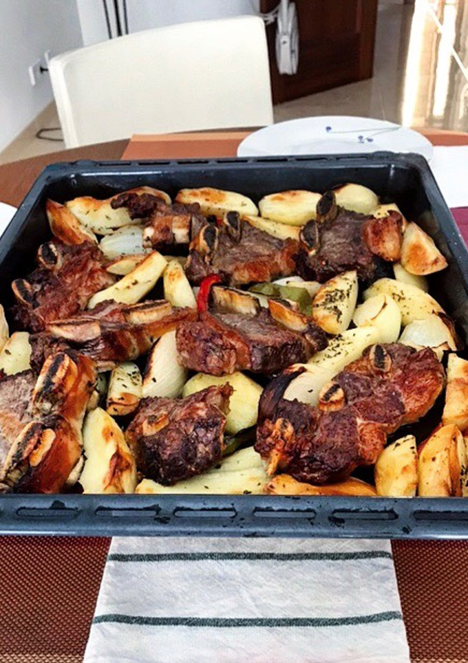 Una foto de Asado argentino al horno