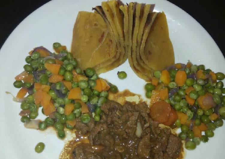 Chapatti served with peas and carrot and stewed beef