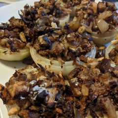 Chestnut stuffed onion cups 🌰 #christmas #vegetarian A picture of Chestnut stuffed onion cups 🌰 #christmas #vegetarian.