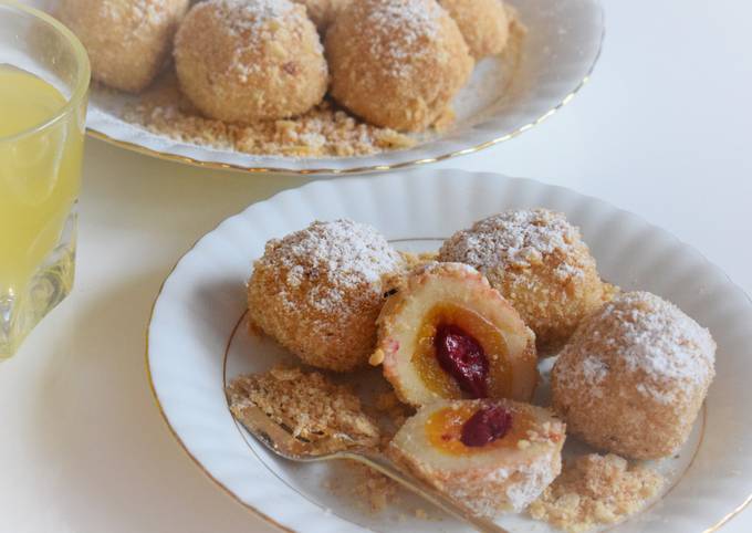 Apricot / cherry dumplings rolled in roasted almond breadcrumbs