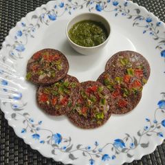 Whole Ragi Mini Uttapa A picture of Whole Ragi Mini Uttapa.