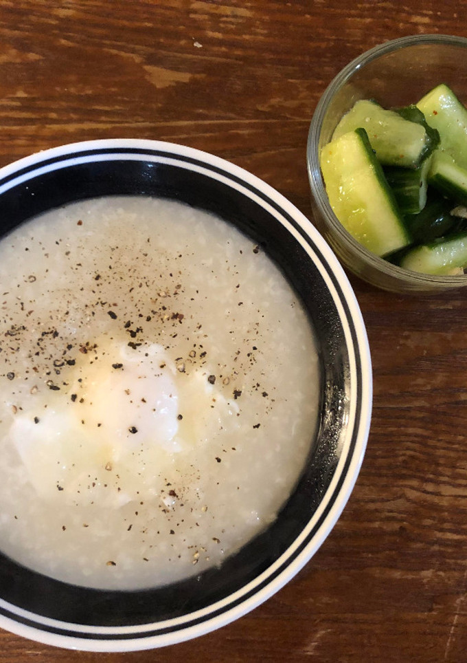 A picture of Let's bond over cucumber salad and egg congee.