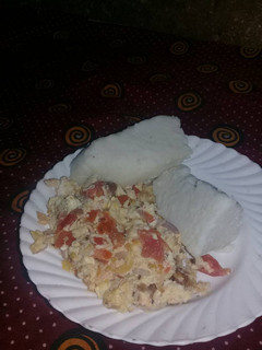 A picture of Fried eggs with ugali.