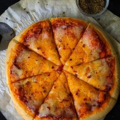 A picture of Homemade Extra Cheese Pizza.