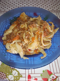 Una foto de Tallarines caseros con tuco