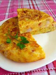 Una foto de Tortilla de patata y gambas