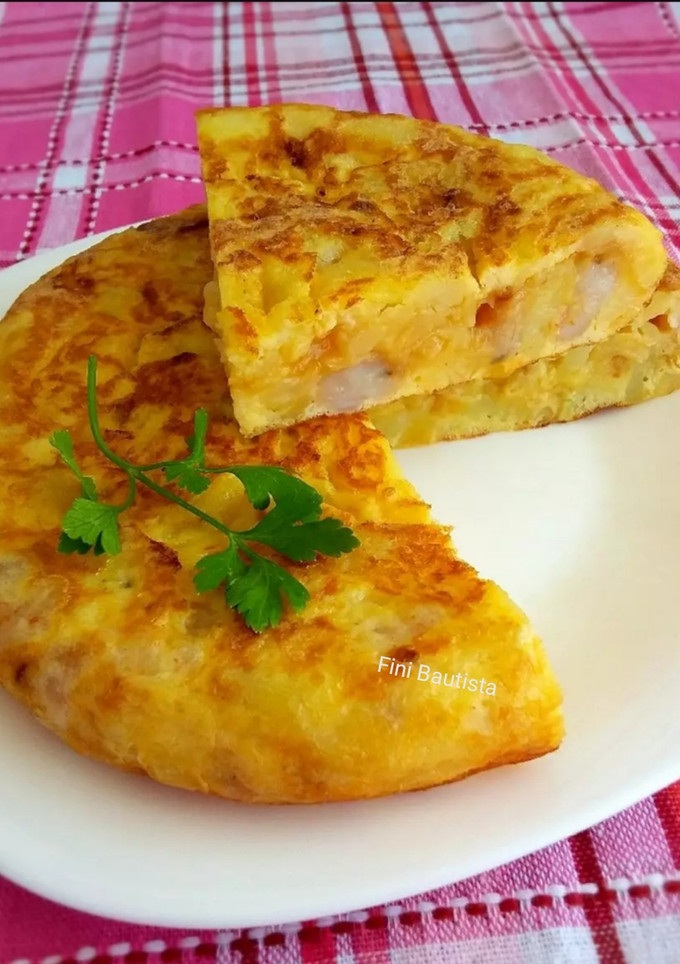 Una foto de Tortilla de patata y gambas