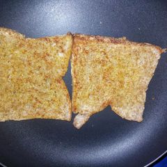 A picture of Simple Pan toasted brown bread #theme challenge.