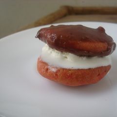 A picture of Sour candy cookies dipped in spiced chocolate sauce.