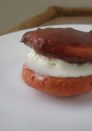 A picture of Sour candy cookies dipped in spiced chocolate sauce.