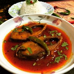 A picture of Achari Tel Ilish (Bengali Fish Curry).