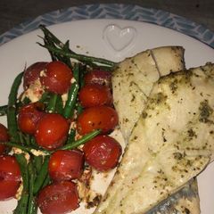 A picture of Pan fried angelfish and vegetables.