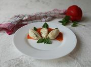 Una foto di gnudi al formaggio