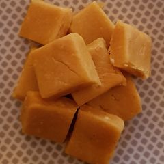 A picture of Besan Ki Burfi with Milk powder.