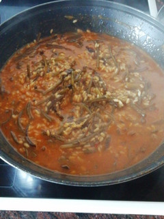 Una foto de Tagarnina en ajo pollo con arroz