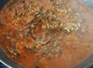 Una foto de Tagarnina en ajo pollo con arroz