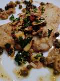 Lemon, caper, and olive fish with almond gremolata