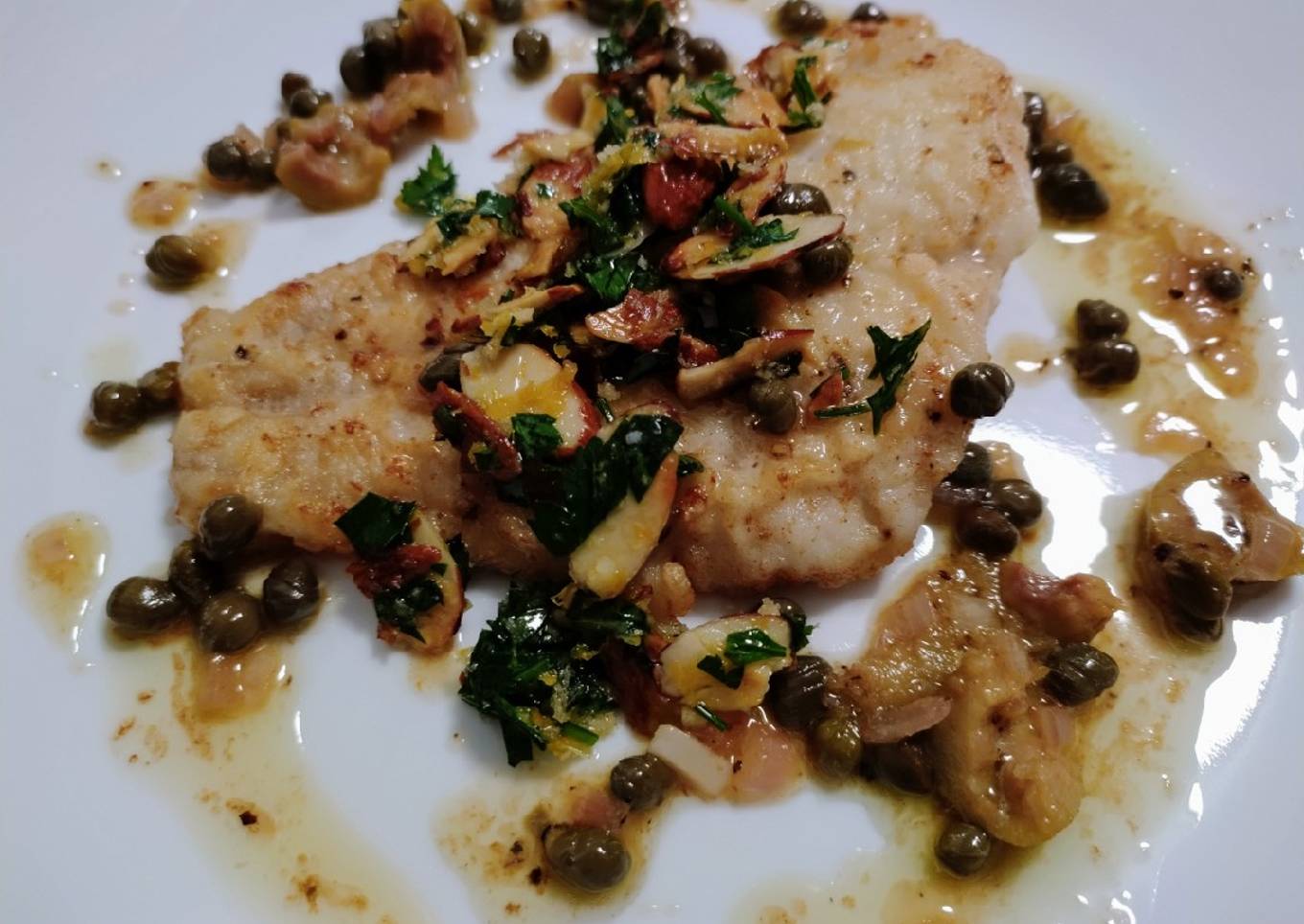 Lemon, caper, and olive fish with almond gremolata