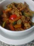 Cerdo salteado con soja miel y curry