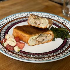 A picture of Grilled Cornish Hen Wrap.