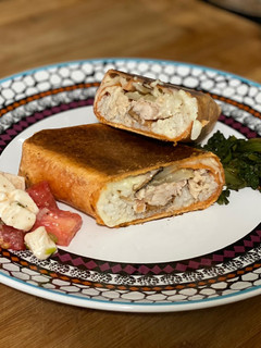 A picture of Grilled Cornish Hen Wrap.