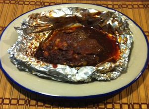 Una foto de Pescado empapelado con chile ancho ©