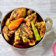 A picture of Golmorich Chicken Bengali style black pepper chicken.