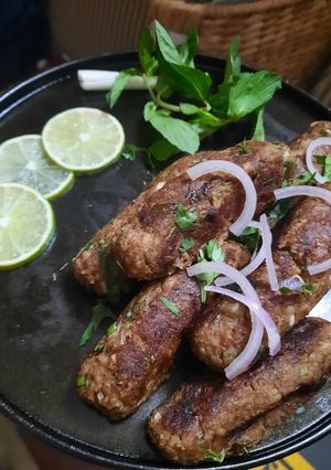 A picture of Mutton Kebab with leftover meat and rice.